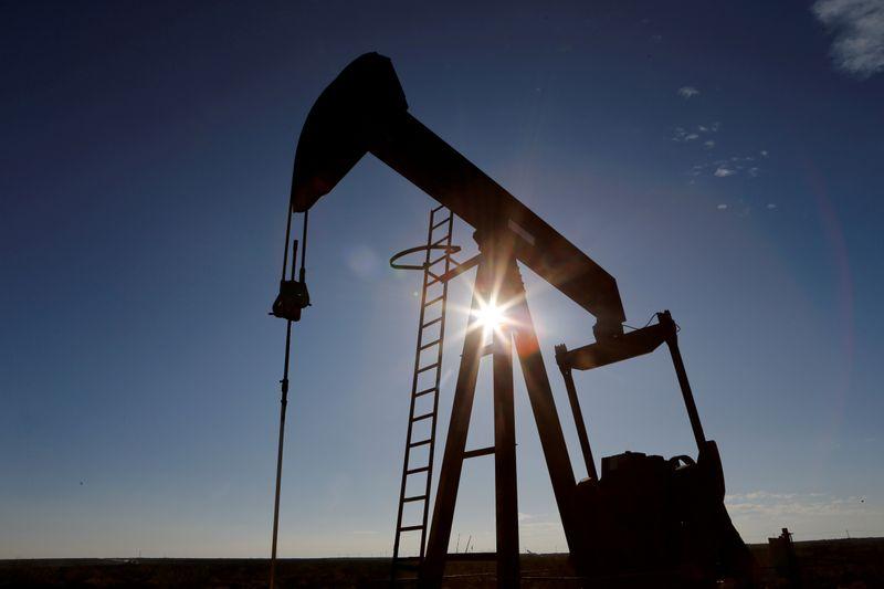 Oil climbs on US stock draw but gains capped as OPEC set to ease cuts