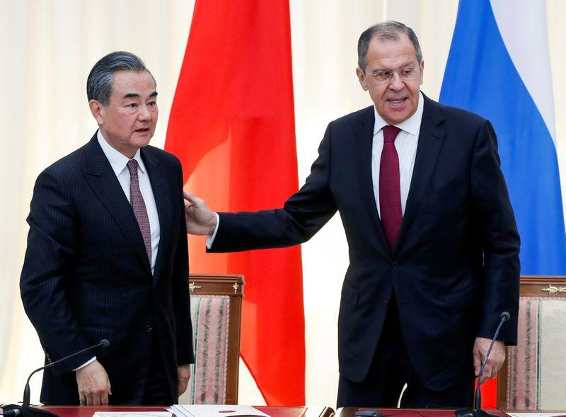 Foreign ministers of China Russia oppose US unilateralism in phone call  Xinhua