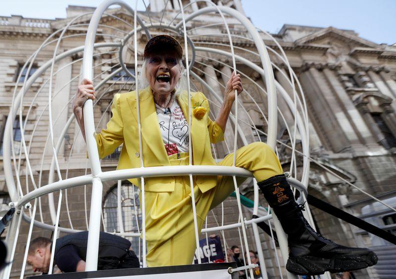 Caged like a canary Vivienne Westwood protests for Assange in London