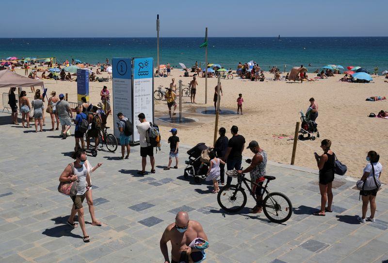 Spain scrambles to contain spiralling infections salvage tourism season