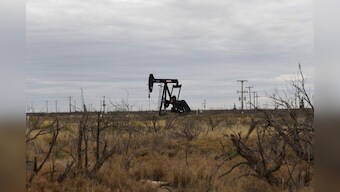 Oil edges up after sharp U.S. crude inventory drop