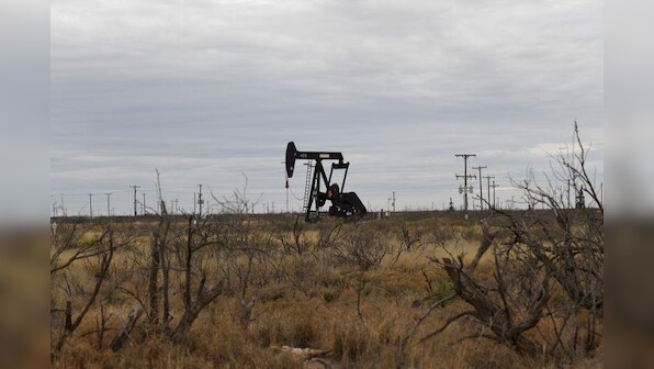Oil edges up after sharp U.S. crude inventory drop