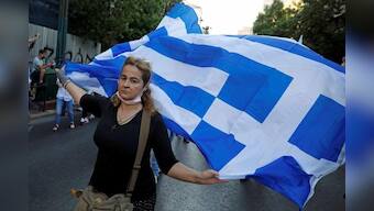 Greek police clash with protesters in rally against mandatory vaccinations