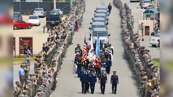 U.S. welcomes home remains of presumed war dead from North Korea