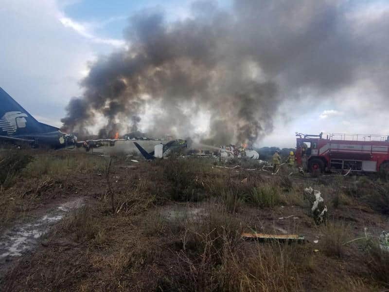 Investigators retrieve black boxes from Mexican plane after stormy