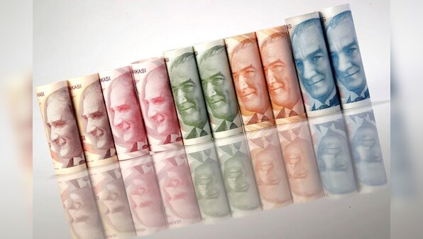 Erdogan tells Turks to buy plunging lira as Trump turns the screws
