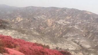 Yosemite reopens its valley, as flames and smoke linger