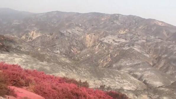 Yosemite reopens its valley, as flames and smoke linger