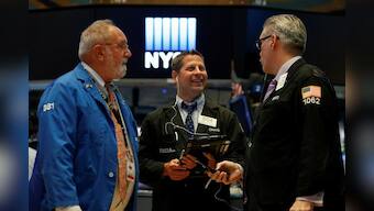 Wall Street rebounds as Walmart beats, trade worries ease