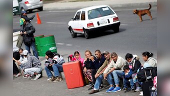Some Venezuelans, alarmed by Maduro's measures, speed up plans to flee