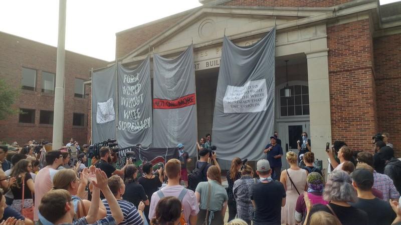 Police seek protesters who toppled Confederate statue in North Carolina Police seek protesters who toppled Confederate statue in North Carolina