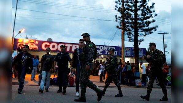 Brazil sends army to border as Venezuelans flee crisis at home