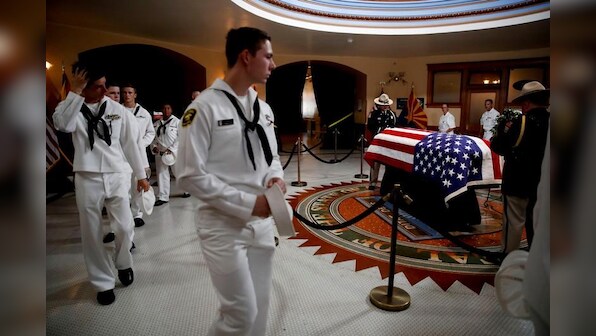 Thousands endure blazing Arizona heat to view Senator John McCain's casket