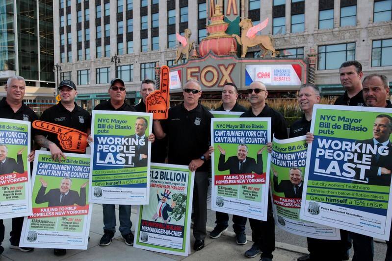 U.S. Democratic candidates attack Trump as Democratic presidential debate opens