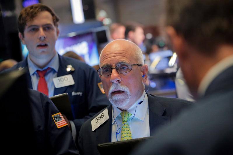 Wall St. drops as trade war woes back in focus
