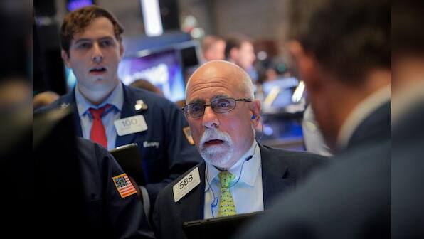 Wall St. drops as trade war woes back in focus