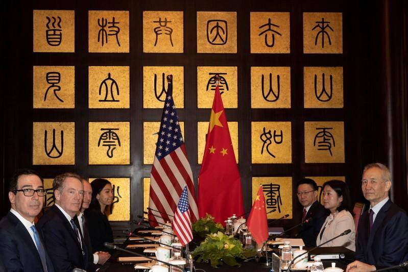 Trump hits China with more tariffs, says Xi moving too slow on trade