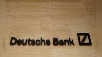 Exclusive: Deutsche Bank sets aside $1.1 billion to exit derivatives