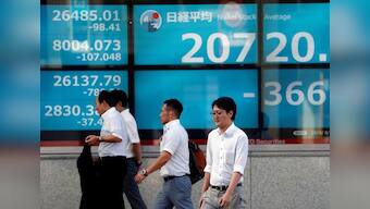 Global stocks deepen losses as U.S. brands China currency manipulator