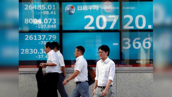 Global stocks deepen losses as U.S. brands China currency manipulator