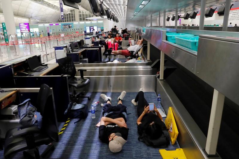 Hong Kong’s airport says it will implement flight rescheduling on Tuesday