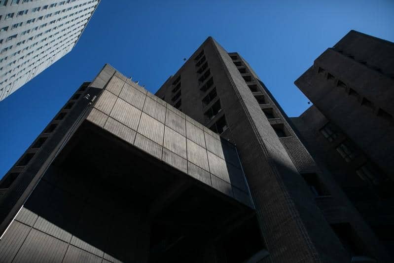 Warden at New York jail where financier Epstein died is removed