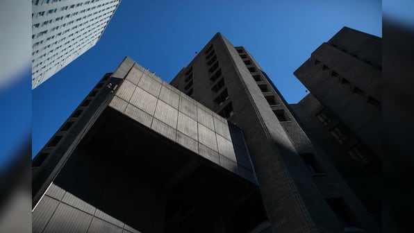 Warden at New York jail where financier Epstein died is removed