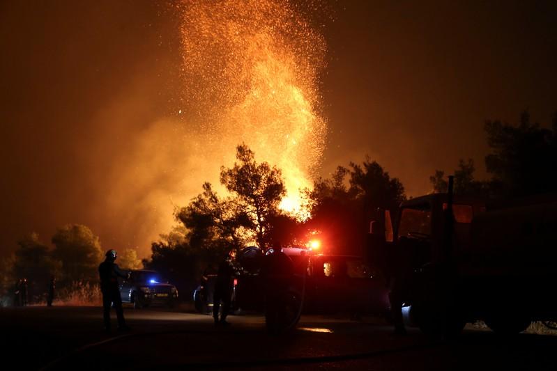 Fire resurges on Greece's Evia, challenges firefighters Fire resurges on Greece's Evia, challenges firefighters