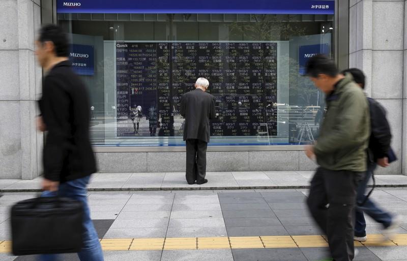 Asian shares nudge higher on stimulus hopes recession fears ease