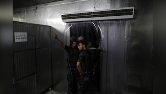 Explosions hit Gaza police checkpoints, three dead - officials