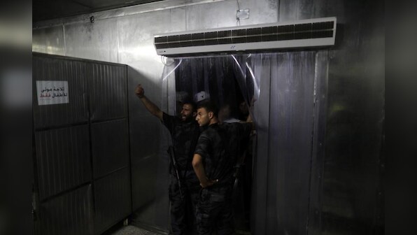 Explosions hit Gaza police checkpoints, three dead - officials