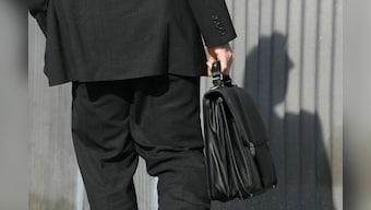 Third of UK's top companies to cut executive pensions - investor body