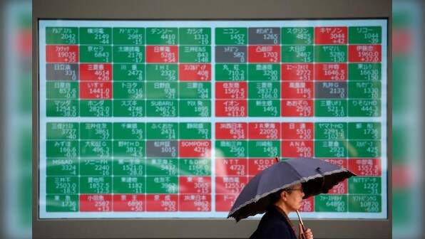 Asian stocks find modest support on firmer U.S. futures
