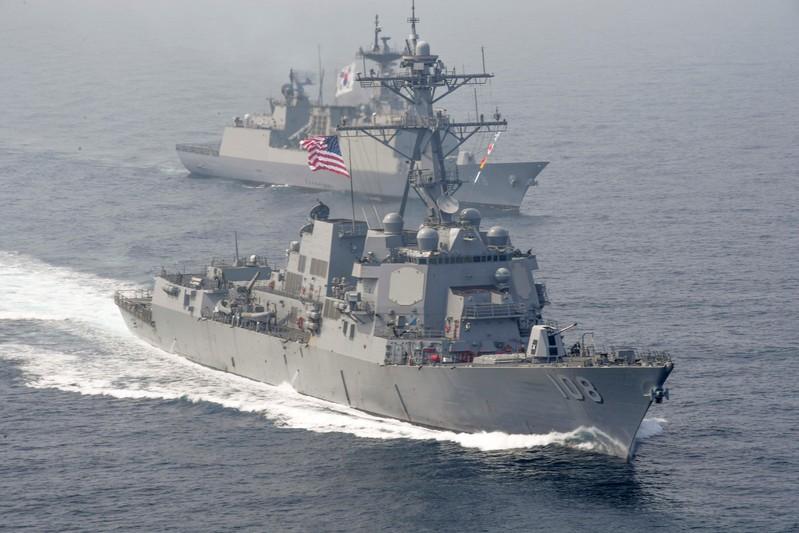 US warship sails near disputed South China Sea islands amid trade tensions