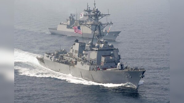 U.S. warship sails near South China Sea islands claimed by China