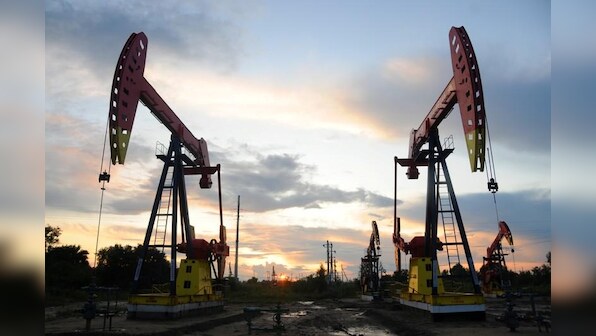 Oil prices hold gains after U.S. inventory drawdown
