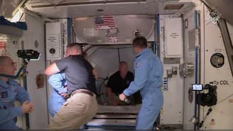 NASA astronauts splash down after journey home aboard SpaceX capsule