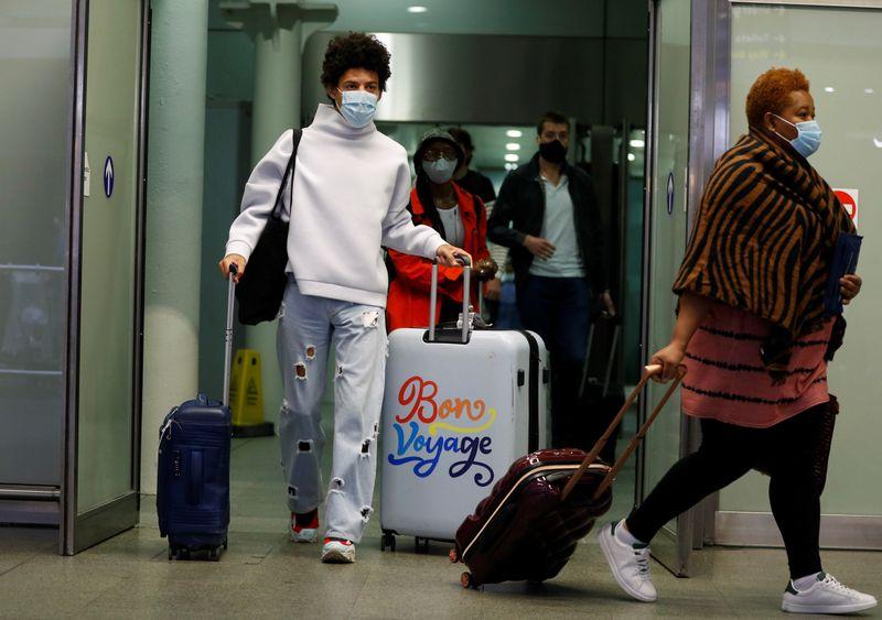 Britons rush home from France to beat new quarantine rules
