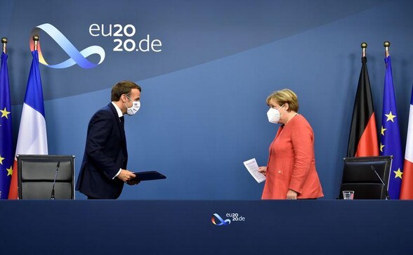 Behind fortress walls, Macron and Merkel to chart Europe's course Behind fortress walls, Macron and Merkel to chart Europe's course