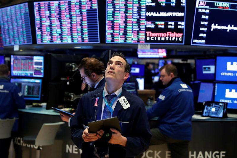 Wall Street ekes out gains as tech stocks eclipse data gloom