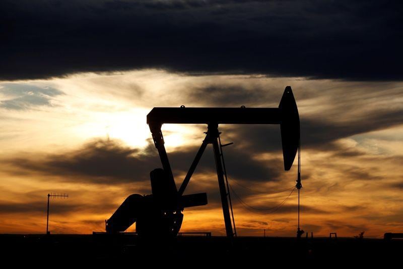 Oil prices rise as storms cut US production