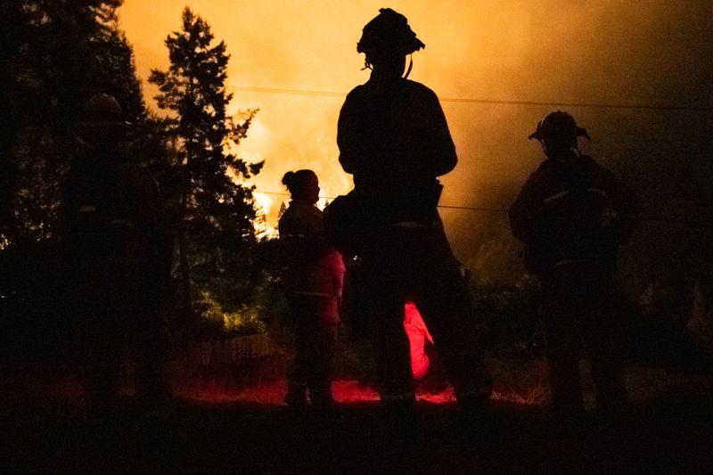 California wildfire home losses leap as evacuees return to torched houses