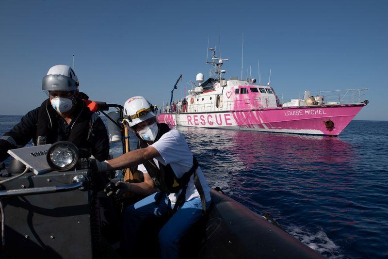 Italy sends help to Banksys overloaded migrant rescue boat