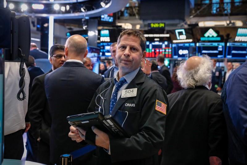 Wall Street flat as looming tariffs offset gains in financials – Firstpost