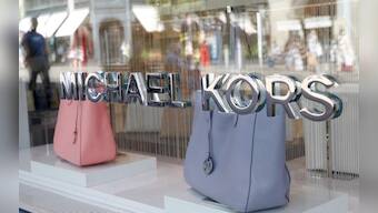 Michael Kors makes high-end fashion statement with $2.2 billion Versace buy