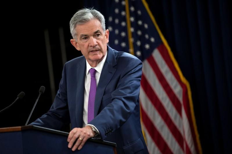 Fed chief Powell signals central bank is done with signaling