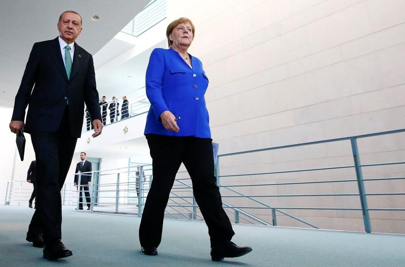 Turkeys Erdogan in Berlin pledges EU visa push