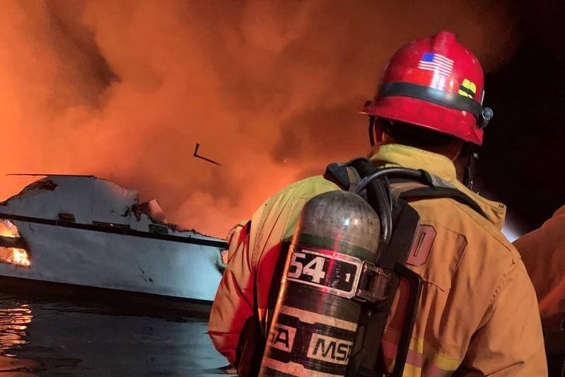 Five rescued, 34 missing in California boat fire: U.S. Coast Guard