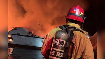 Five rescued, 34 missing in California boat fire: U.S. Coast Guard