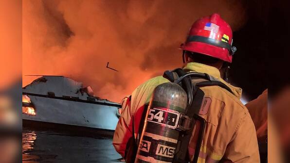 Five rescued, 34 missing in California boat fire: U.S. Coast Guard